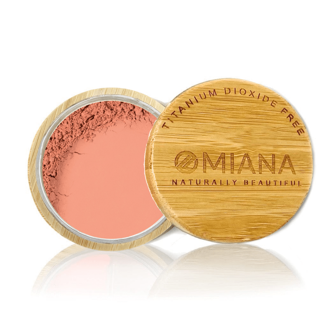 Omiana Loose Powder Mineral Blush Makeup in a bamboo container on a white background